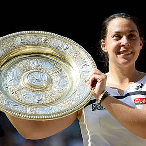 Marion Bartoli Holding Up Trophy Wallpaper