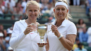 Martina Navratilova Jana Novotna Holding Trophy Wallpaper