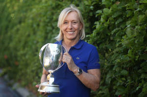 Martina Navratilova Posing With Trophy Wallpaper