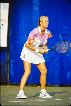 Mary Pierce Performing An Intense Tennis Match Wallpaper