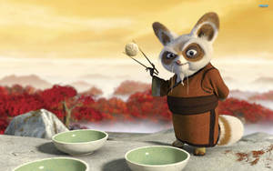 Master Shifu Demonstrating Incredible Agility With Chopsticks In Kung Fu Panda. Wallpaper