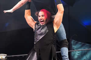 Matt Hardy In Aew Wrestling Attire Showcasing His Fiery Red Hair. Wallpaper