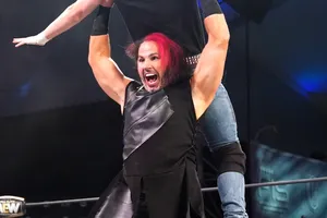 Matt Hardy In Aew Wrestling Attire Showcasing His Fiery Red Hair. Wallpaper