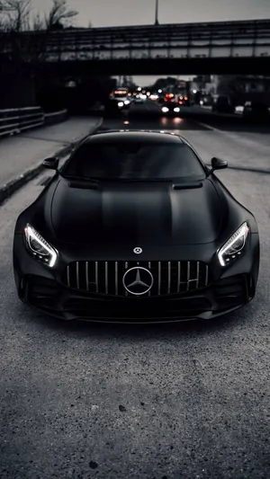 Matte Black Amg On The Road Wallpaper