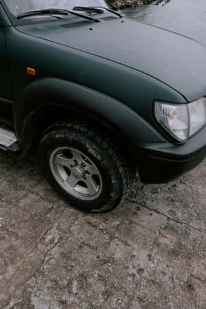 Matte Black S U V Closeup Wallpaper