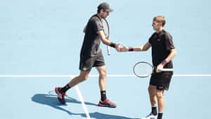 Max Mirnyi Shaking Hands With Partner Wallpaper