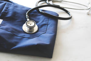 Mbbs Stethoscope And Scrubs Wallpaper