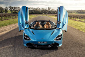 Mclaren 720s Blue Country Wallpaper