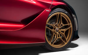 Mclaren 720s Golden Rims Wallpaper