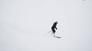 Men In Black Skiing Wallpaper