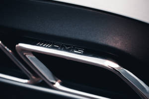 Mercedes Amg Chromed Emblem Wallpaper