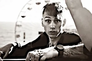 Mgk At The Amusement Park Wallpaper