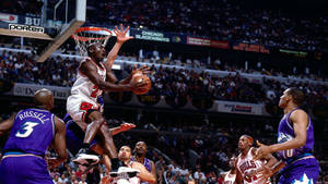 Michael Jordan Performing His Best Nba Move Wallpaper