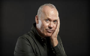 Michael Keaton Hand On His Face Wallpaper