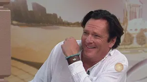 Michael Madsen Smiling During Interview Wallpaper