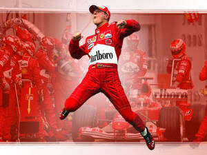 Michael Schumacher Jumping In Excitement Wallpaper