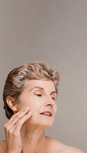 Middle Aged Woman Skincare Routine Wallpaper