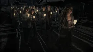 Midnight Mass People With Lit Candles Wallpaper