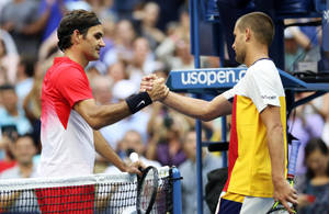 Mikhail Youzhny And Roger Federer Handshake Wallpaper