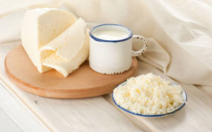 Milk And White Cheese On A Table Wallpaper