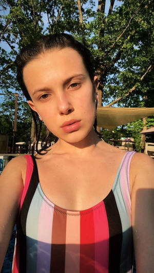 Millie Bobby Brown Golden Hour Selfie Wallpaper