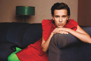 Millie Bobby Brown In Red Dress Wallpaper