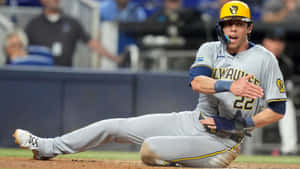 Milwaukee Brewers Player Sliding Into Base Wallpaper