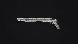 Minimalist Desktop Gun Shaped By Words Wallpaper