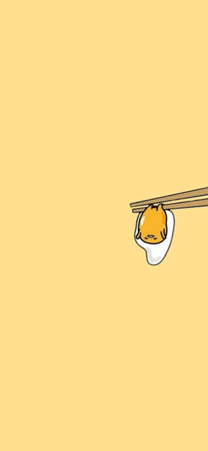 Minimalist Photo With Chopsticks And Gudetama Aesthetic Wallpaper