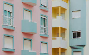 Minimalist Residential Buildings In Pastel Colors Wallpaper