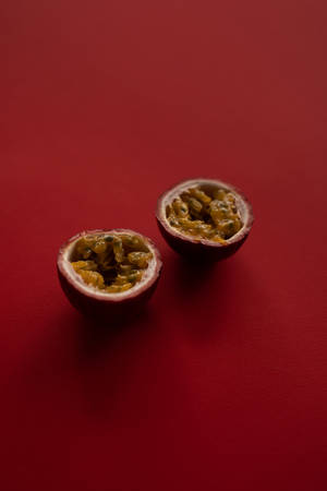 Minimalist Ripe Passion Fruit Presentation Wallpaper