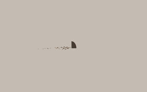 Minimalist Shark Design On Brown Aesthetic Laptop Wallpaper