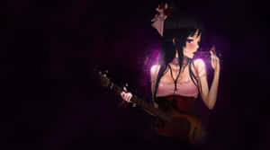 Mio Akiyama Strumming Her Bass In A Dramatic Light Wallpaper