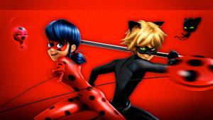 Miraculous Ladybug And Cat Noir With Weapons Wallpaper