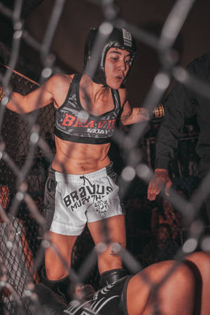 Mma Female Fighter In Gear Wallpaper