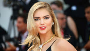 Model And Actress Kate Upton Flaunting Her Figure. Wallpaper