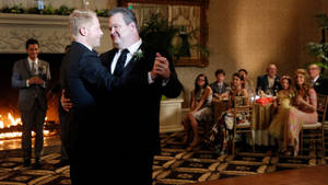 Modern Family Cam And Mitch Dancing Wallpaper