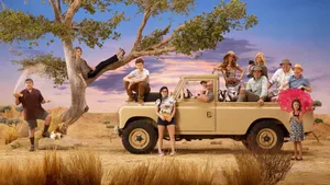 Modern Family Sitcom Savannah Season Poster Wallpaper