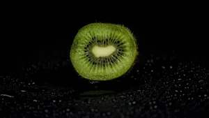 Moist Kiwi Fruit Cut Wallpaper