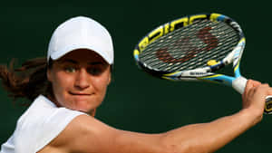 Monica Niculescu Swinging Racket Up-close Wallpaper