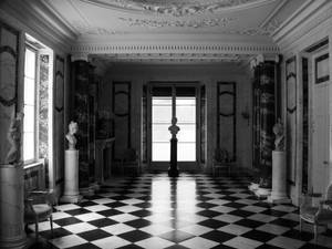 Monochrome Hallway With Checkered Floor Wallpaper
