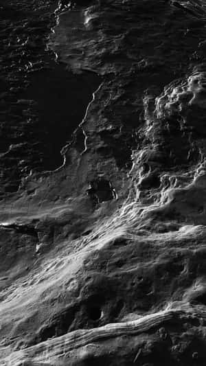 Monochrome_ Water_ Ripples_and_ Rock_ Formations.jpg Wallpaper