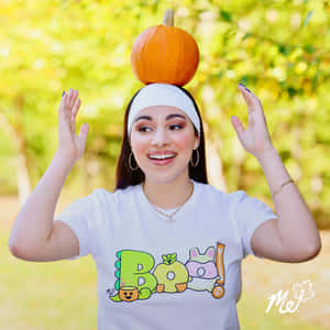 Moriah Elizabeth With Pumpkin Wallpaper