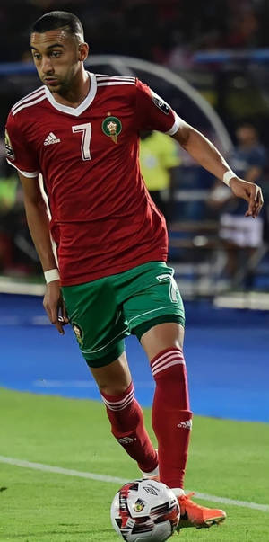 Morocco National Football Team Hakim Ziyech Kicking Ball Wallpaper