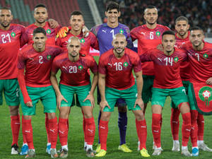 Morocco National Football Team With Blue Player Wallpaper