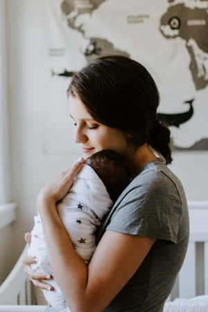 Mother Infant Embrace.jpg Wallpaper