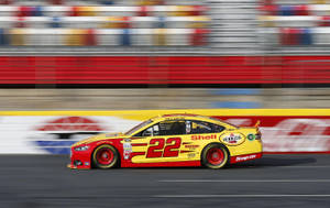 Motion Photograph Of Joey Logano’s Car Wallpaper