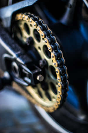 Motorcycle Chainand Sprocket Closeup Wallpaper