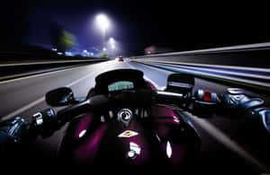Motorcycle Speeding Night Ride Wallpaper
