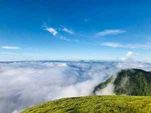 Mountain Top With Azure Sky Wallpaper
